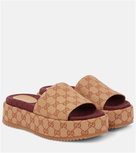 gucci gg canvas slides|Gucci original slides.